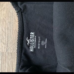 Black ribbed body suit